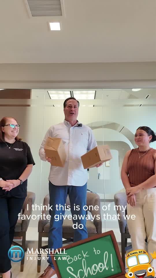 Two teacher giveaway winners with Eric at the office